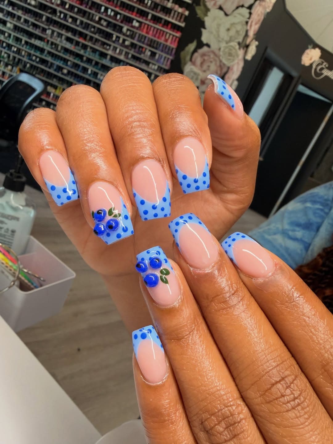 Blue polka dot French tip stiletto nails