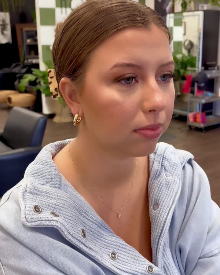 Soft glam makeup application on a client
